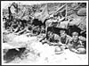 Thumbnail of file (352) D.2799 - Happy Tommies at the entrance of the shelters they have erected whilst waiting in reserve