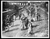 Thumbnail of file (116) C.1392 - Cyclist [sic] passing through a village just captured from the Germans