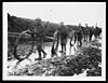 Thumbnail of file (15) C.1050 - Wiring parties going up to the front line after heavy rain