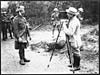 Thumbnail of file (82) D.551 - French official kinematographer taking a close picture of one of our wounded