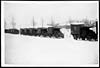 Thumbnail of file (509) D.735 - Ambulance cars awaiting orders in the snow