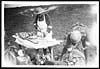 Thumbnail of file (94) D.1262 - White aproned R.A.M.C. men preparing sandwiches for wounded just behind the lines