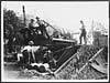 Thumbnail of file (317) D.2725 - Stripped gunners at work loading a big gun