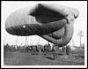 Thumbnail of file (247) D.2106 - One of our observation balloons coming to earth after a morning's work peering over the lines