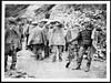 Thumbnail of file (474) D.654 - Working party about to start off in the rain wearing waterproof sheets and trench waders