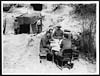 Thumbnail of file (125) D.1346 - Though near the line the M.O.'s of a Dressing Station still have their table, chairs and white tablecloth