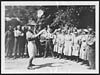Thumbnail of file (71) L.581 - W.A.A.C. cooks in France watching a British soldier doing a juggling turn with plates