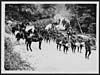 Thumbnail of file (110) L.666 - Manchester Regiment on a road in France, marching past on their way to the line
