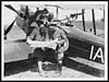 Thumbnail of file (15) N.395 - C.O. with pilot and observer referring  to photos and maps prior to setting out for the German lines