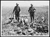 Thumbnail of file (24) N.410 - Messenger dogs with their keepers going across country up to the front line