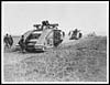 Thumbnail of file (37) X.25012 - Tanks passing dead Germans who were alive before the cavalry advanced a few minutes before the picture was taken