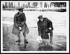 Thumbnail of file (54) X.32025 - Two officers curling on a frozen canal with ice blocks