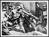 Thumbnail of file (27) X.33009 - Boche Machine Gun crew captured, bringing in their own gun
