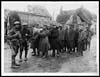 Thumbnail of file (28) X.33091 - German prisoners, some of whom are carrying wounded comrade