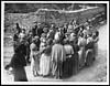 Thumbnail of file (108) X.34096 - Inhabitants of a newly captured village are greatly interested in a British machine gunne