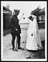 Thumbnail for 'C.1889 - British officer conversing with a little French girl who is just going to her first mass'