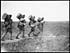 Thumbnail for 'D.1055 - Our men going up with coils of wire for lining up new positions'