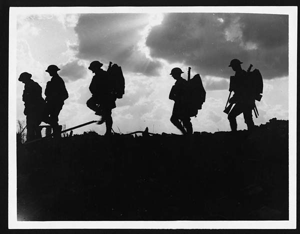 (311) C.2494 - Troops moving up at eventide - men of a Yorkshire regiment on the march
