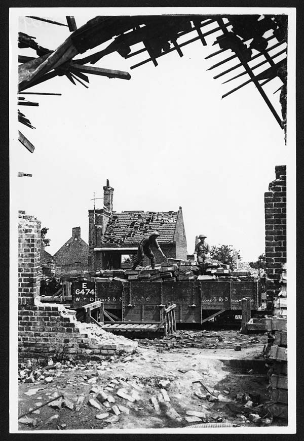 (201) D.1695 - Scene through a shelled house