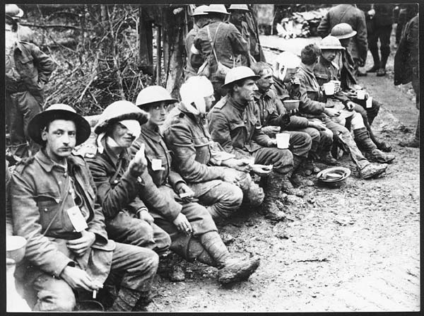 (432) D.548 - Row of our wounded of the 13th having light refreshments at the Dressing Station