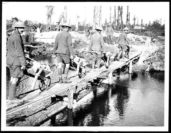 (243) D.2100 - Men of an English county regiment crossing a temporarily constructed bridge