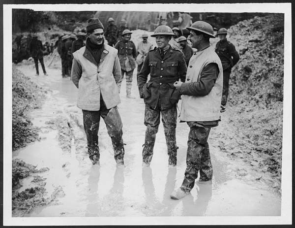 (475) D.655 - Three officers having a chat - wearing trench waders