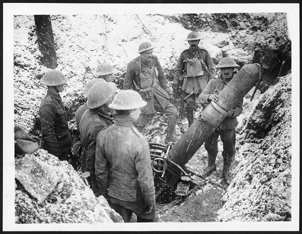 (590) D.975 - Loading a big trench mortar in a front line Boche trench