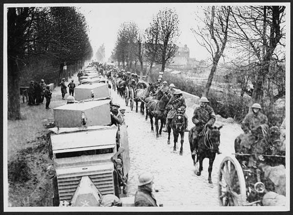 (63) L.564 - French armoured cars and British transport going forward in France