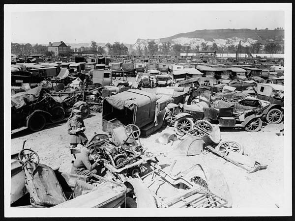 (85) L.601 - War torn cars at a depot awaiting repair