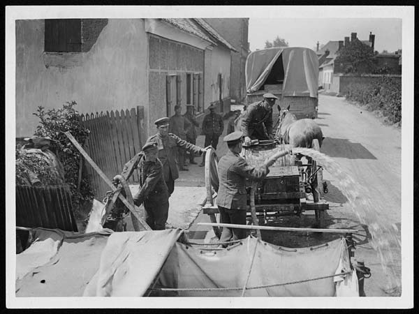 (101) L.654 - Pure water being pumped into a water cart, to be taken to the troops
