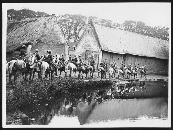 (53) L.706 - Royal Scots Greys riding through a village