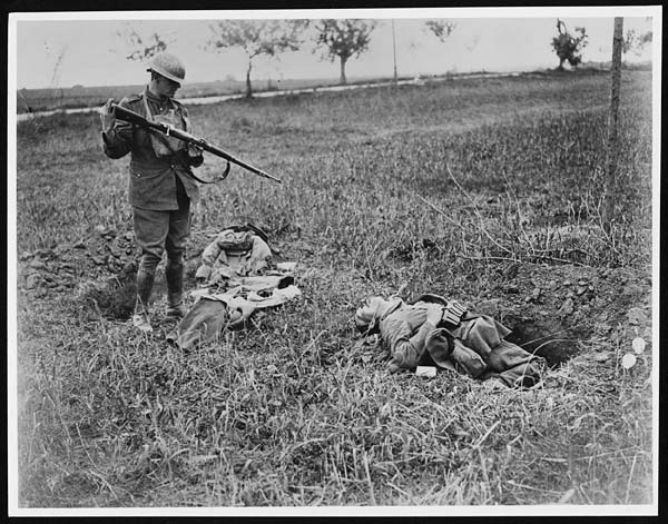 (61) X.25026 - One of the enemy who was killed by Canadian Cavalry a few minutes before-hand