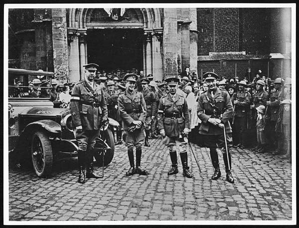 (62) X.25028 - H.R.H. the Prince of Wales with General Currie and the Canadian divisional general whose men captured Denain, standing outside the Church of that town