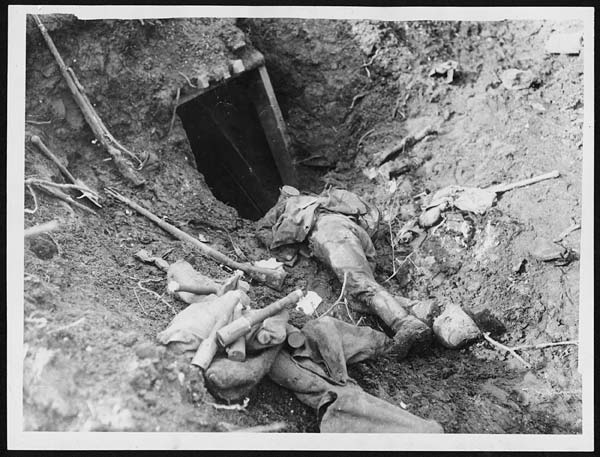 (24) X.32063 - Dead German outside dug-out