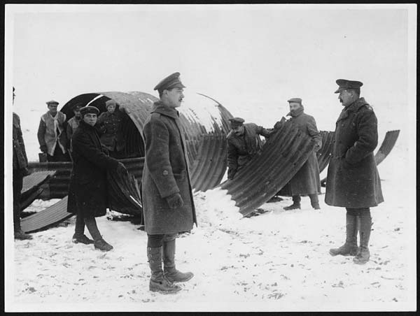 (160) X.35037 - Building a Nissen hut in the snow