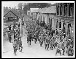 O.944Canadian captives marching through a town