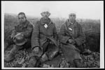 D.544Three youthful German prisoners of 17 years resting on their way to the cage
