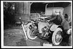 D.726Member of the first Aid nursing Yeomanry oiling her car