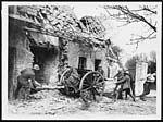 D.2663Bringing a field gun into action alongside a ruined cottage