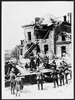 D.2700Anti-aircraft gun in action in the ruins