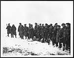 D.759Some Scottish troops taking a halt in the snow