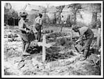 D.1344Soldiers during their spare time collect plants and flowers to decorate the graves of our heroes