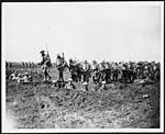 D.1169Infantrymen on the move in formation to the attack