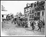 D.1015On the track of the Hun - some of our troops entering town of Peronne