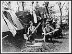 L.567R.A.F. men salving bombs from a wrecked German aeroplane