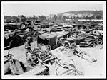 L.601War torn cars at a depot awaiting repair