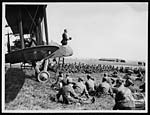L.1127Army chaplain conducts a service from the cockpit of an aeroplane, France, during World War I
