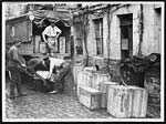 N.433French soldiers removing the wines from the cellars in Amiens into lorries