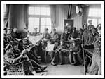 N.479Convalescent soldiers in France in the corner of a reading-room at a recreation hut provided for them by the B.R.C.S.